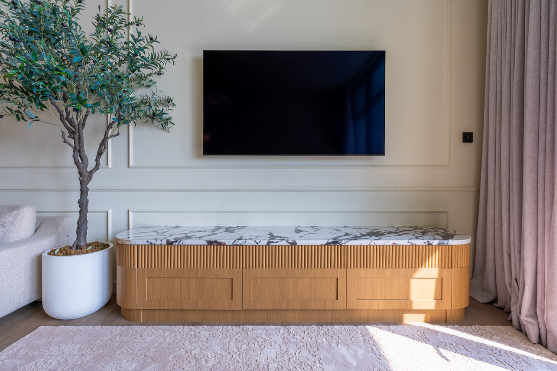 Custom oak media console with marble top made in the ACD Studio joinery workshop